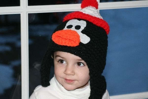 Unique handmade character hat made to look like Chilly Willy penguin with ear flaps