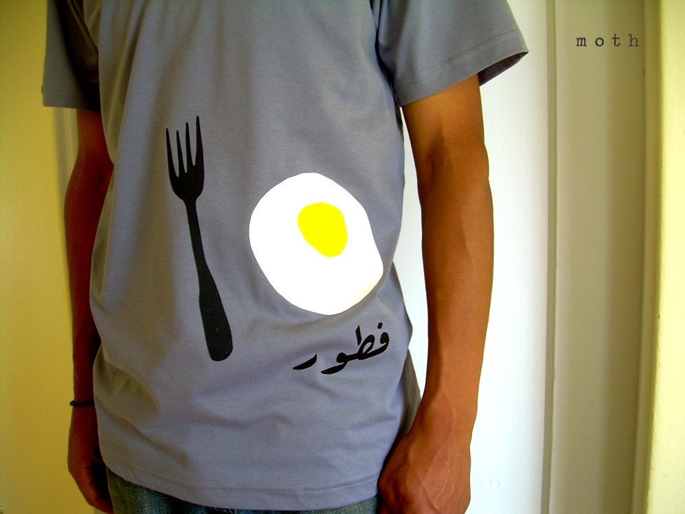 this shirt says 'breakfast' in <span class=