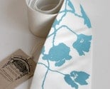Silk Poppy pattern screenprinted necktie, sky blue on white