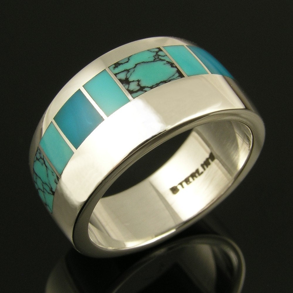 Women's  silver band inlaid with turquoise and gem silica by Mark Hileman.