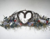 Twig Wall Piece with Heart Shaped Center decorated with Shells and Dried Flowers