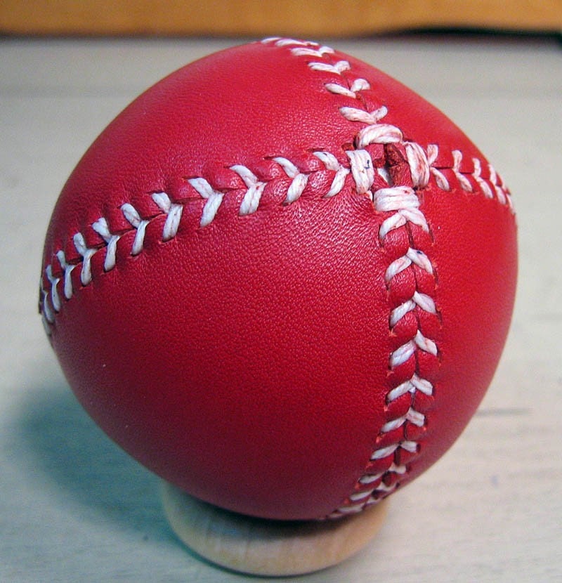 LEMON BALL Vintage style lemon peel style baseball.  Red leather with white stitches