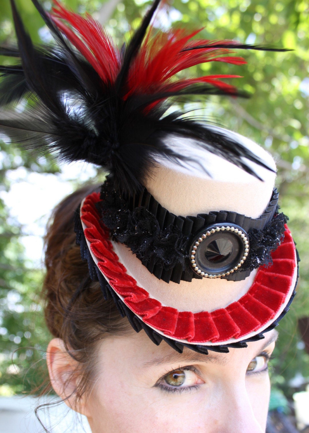 TODDIE TOPPER - Cream Mini Top Hat w/ Red Velvet Trim and Box Pleated Sparkle Trim, Red and Black Feathers Topped with Vintage Button