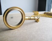 Magnified Necklace Extra Long in Raw Brass - ONLY ONE