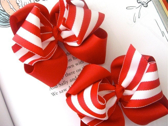 Pair of layered red and white striped candy cane hair bows