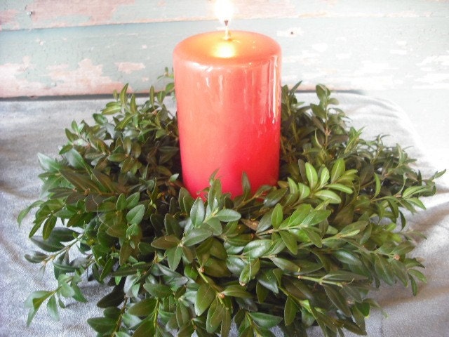 Fresh Boxwood candle ring with pillar candle.