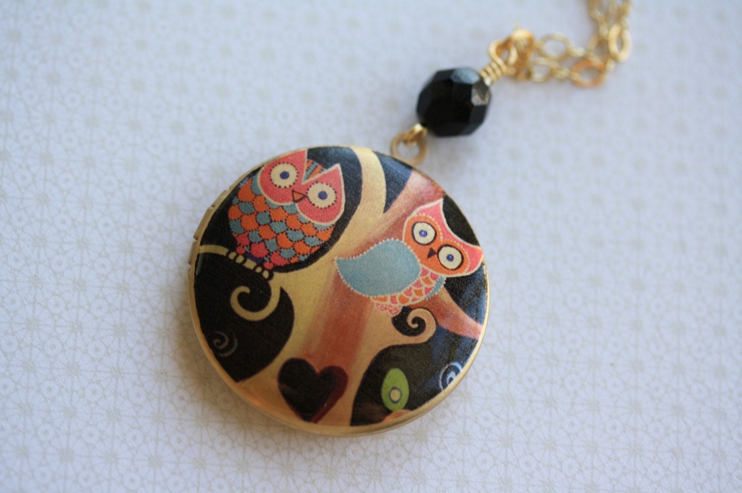 The Whimsical Perching Owls Locket Necklace