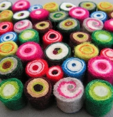 10 
misc hand-felted beads