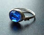 Cobalt blue faceted ring  wrapped in silver