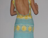 A soft blue and yellow hand crochet dress
