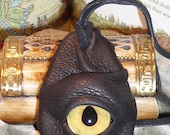 Dragon eye pendant (Black leather with sandstone eye)