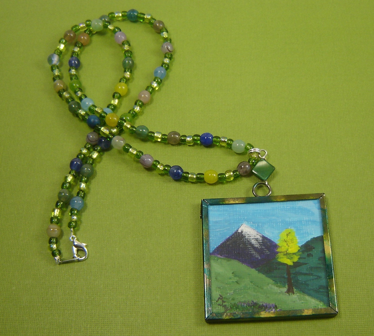 Mountain painting in metal frame necklace