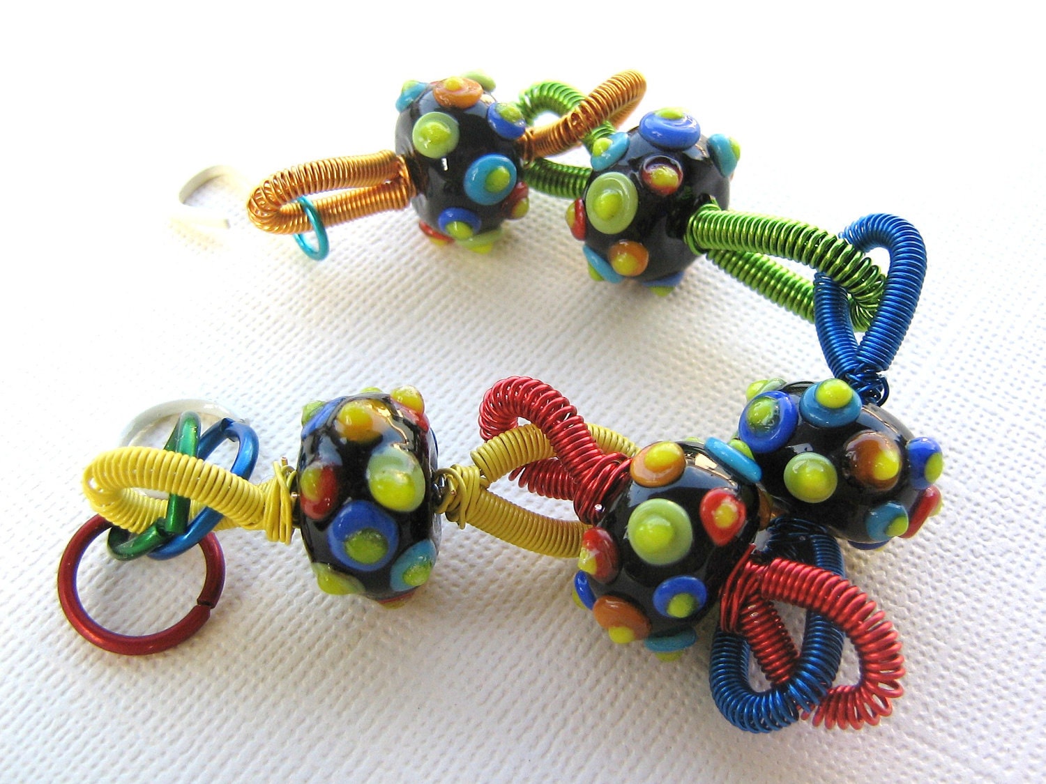 Lolly - Rainbow lampwork bumpies with bright multi-colored coiled wire bracelet - Jenniflair original