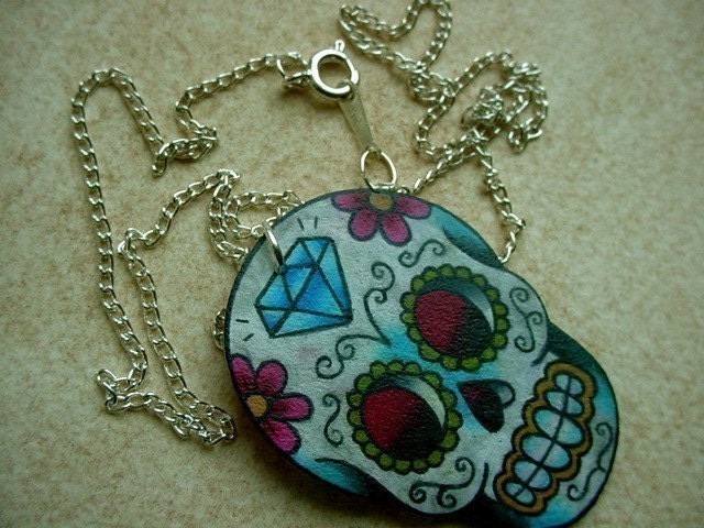 vintage tattoo style dia de los muertos (day of the dead) sugar skull with flowers and diamond necklace