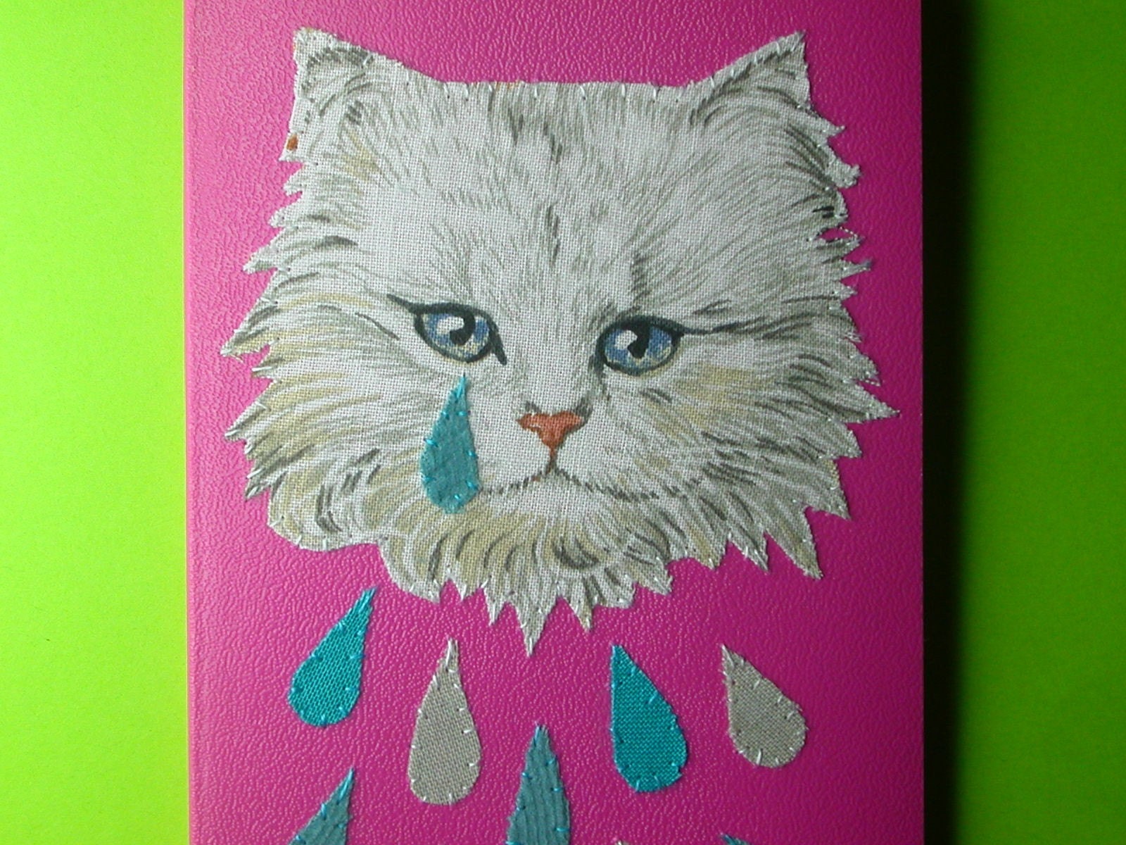 weeping kitten pocket notebook