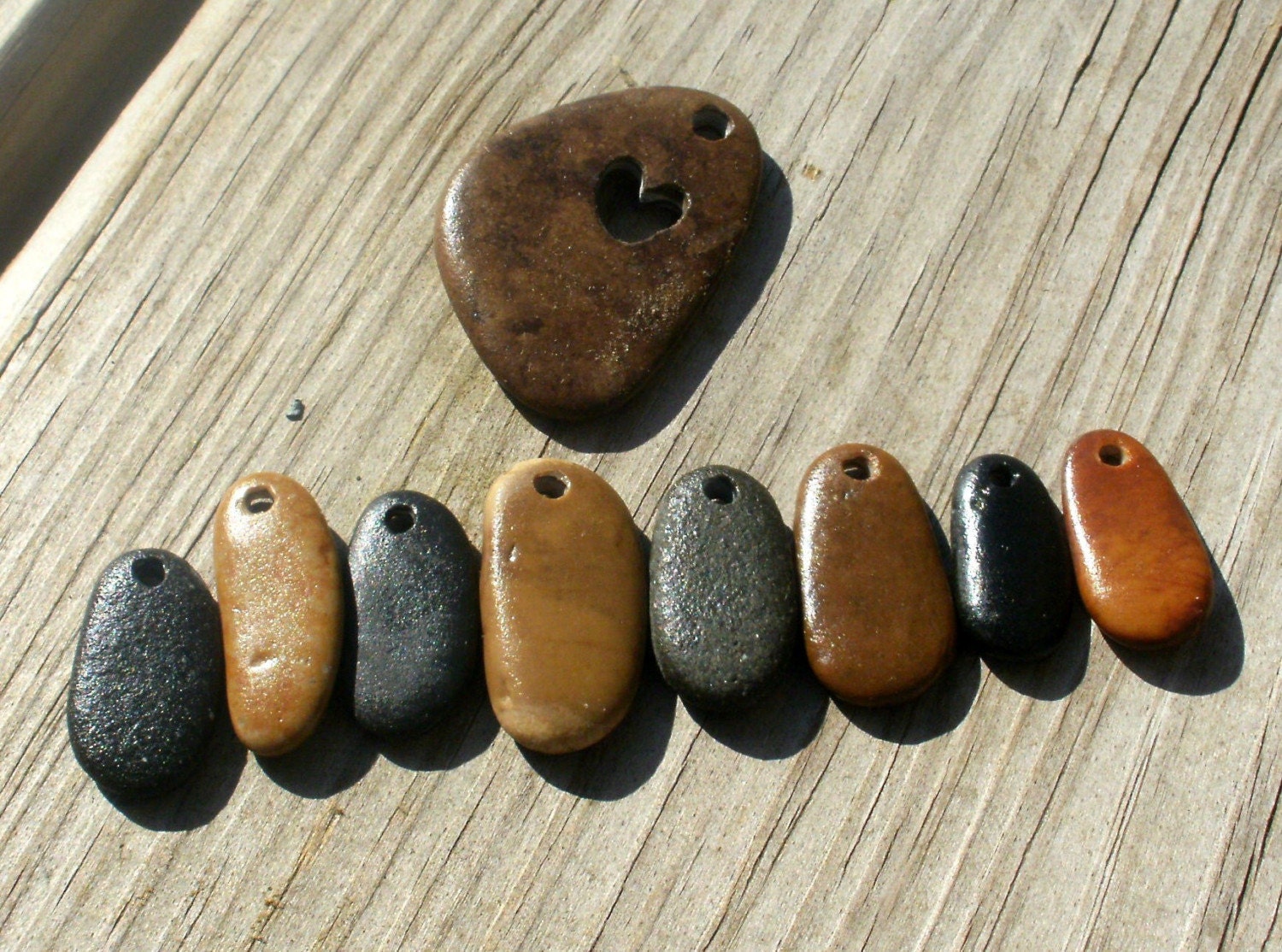 LOVE AND DANGLES genuine drilled and engraved beach stones
