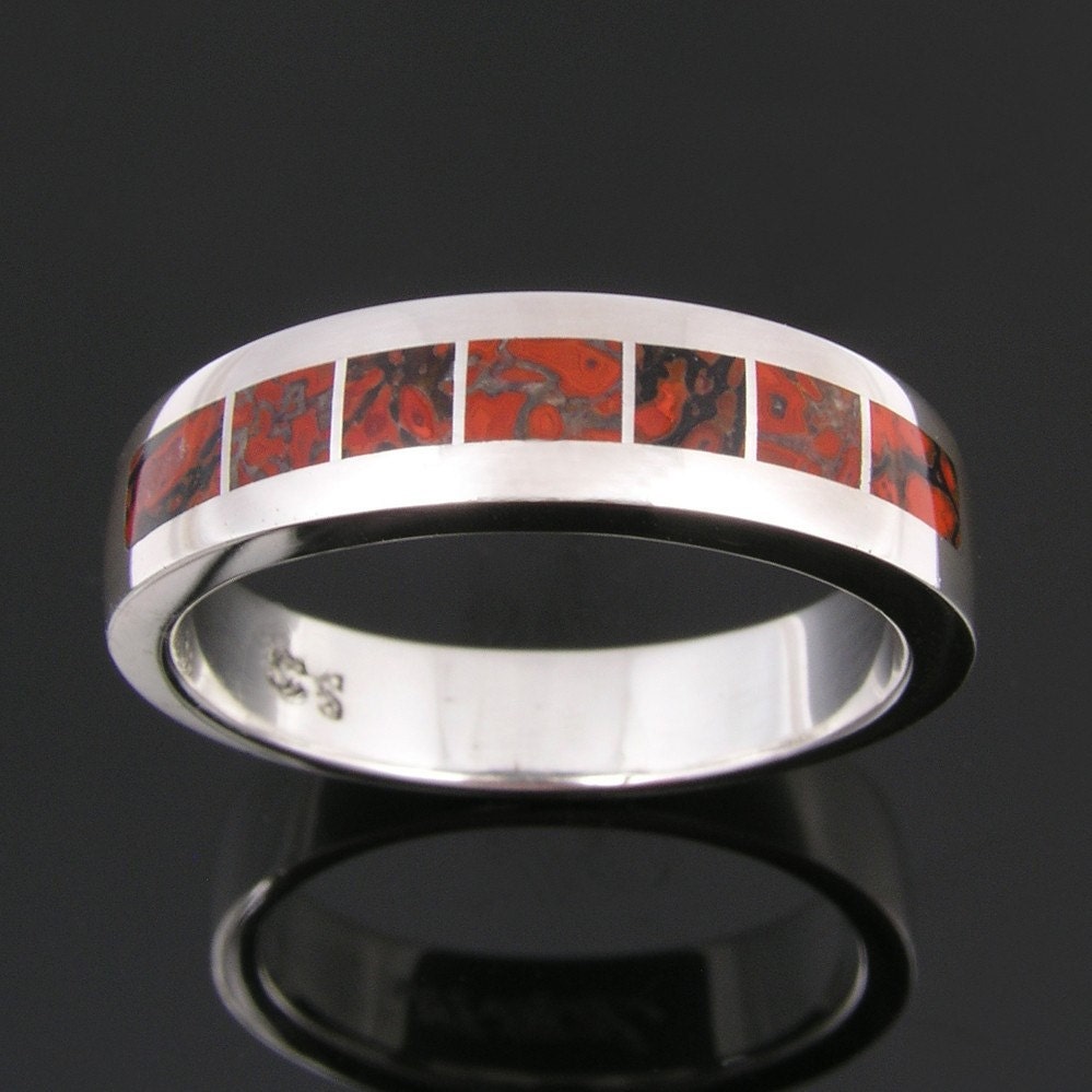 Sterling silver wedding ring with red dinosaur bone inlay by Hileman Silver