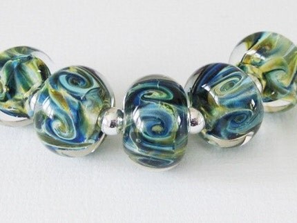 five lampwork beads, in one of my favourite blue-green combinations