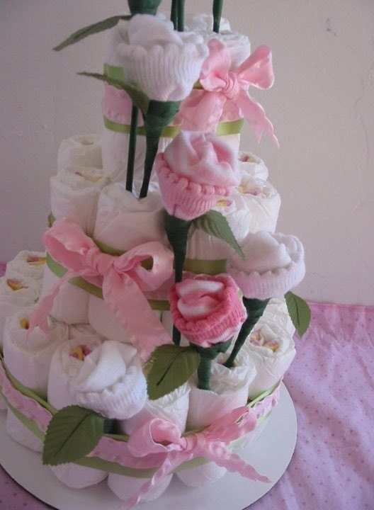 pink cascading sock flower diaper cake