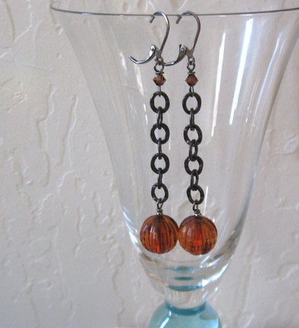  pumpkin shaped beads in transparent dark amberorange lucite