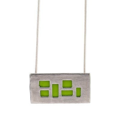 silver pendant with Lime cutouts