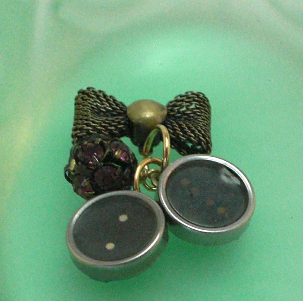 Supplies Moxie Nerve Food, Vintage Type Writer Keys, Deep Purple Swarovski Encrusted Bead, and a Gunmetal Bow Link Jewelry Supplies Featured Design from Foxie Moxie Jewels