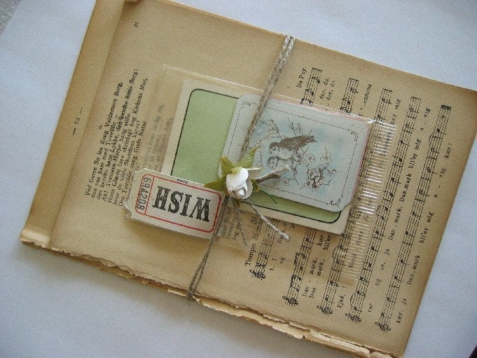 Art Kit no. 1 - Vintage book pages and old playing cards.