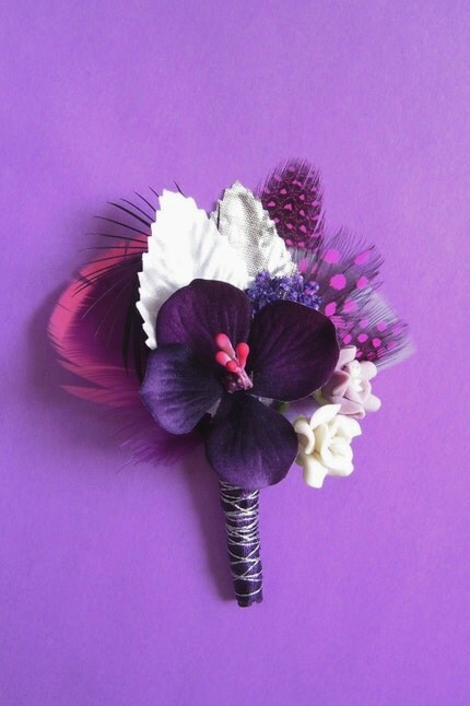  with a dark purple ribbon with silver metallic floss wrapped around