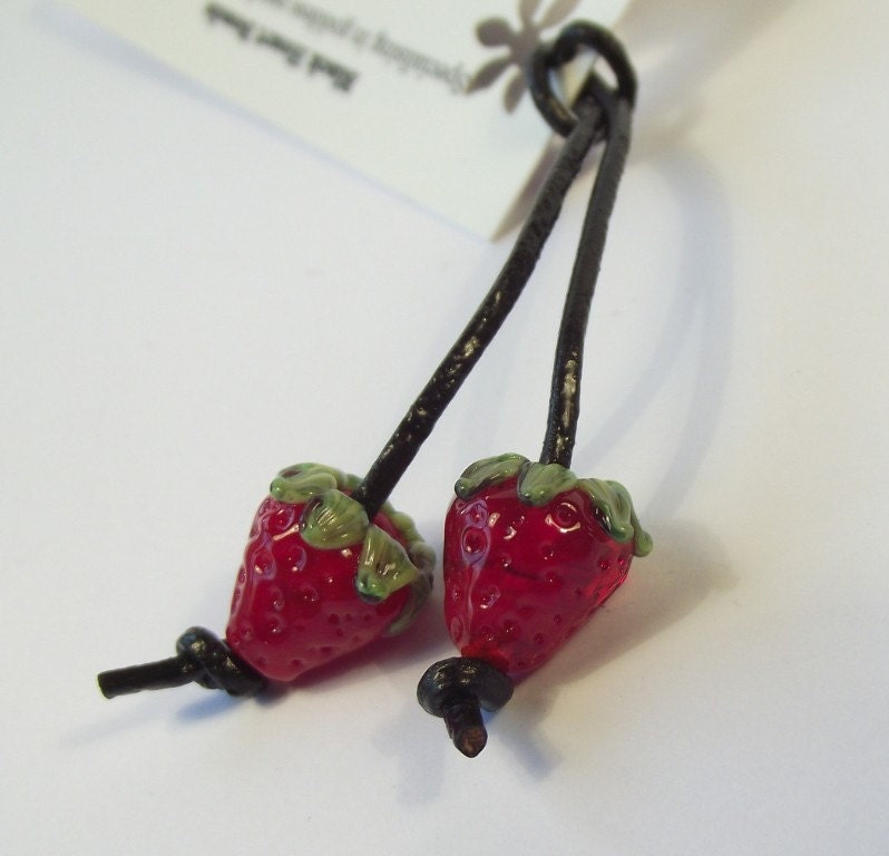 This pair of mini strawberry beads look almost edible. They are the perfect size for using on earrings.