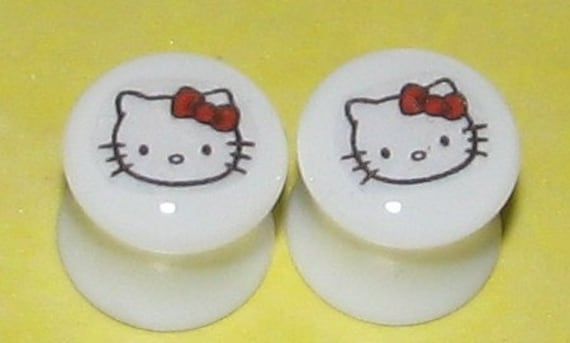 Hello Kitty Gauges For Ears. A pair of Hello Kitty Resin