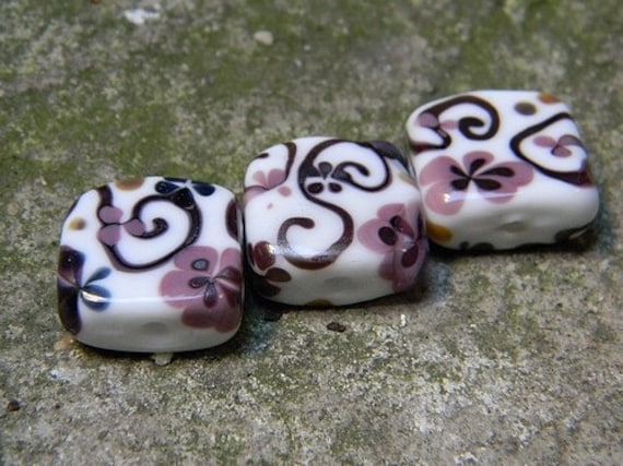 These Swirly and Flowery Tiles were created by me using white, violet and slightly reducing purple glass