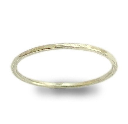 Smile -  a thin shiny hammered sterling silver band.