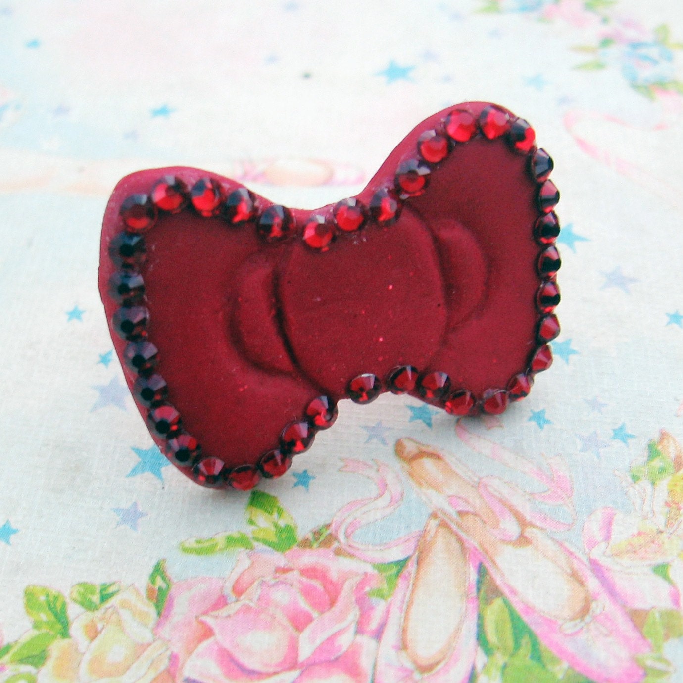 Hello Kitty red bow ring with Swarovski crystals. From dollhouserepublic