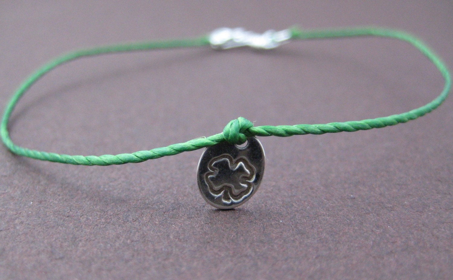 Lucky Charm.  Sterling Silver Hand Stamped Four Leaf Clover Bracelet on Cord.