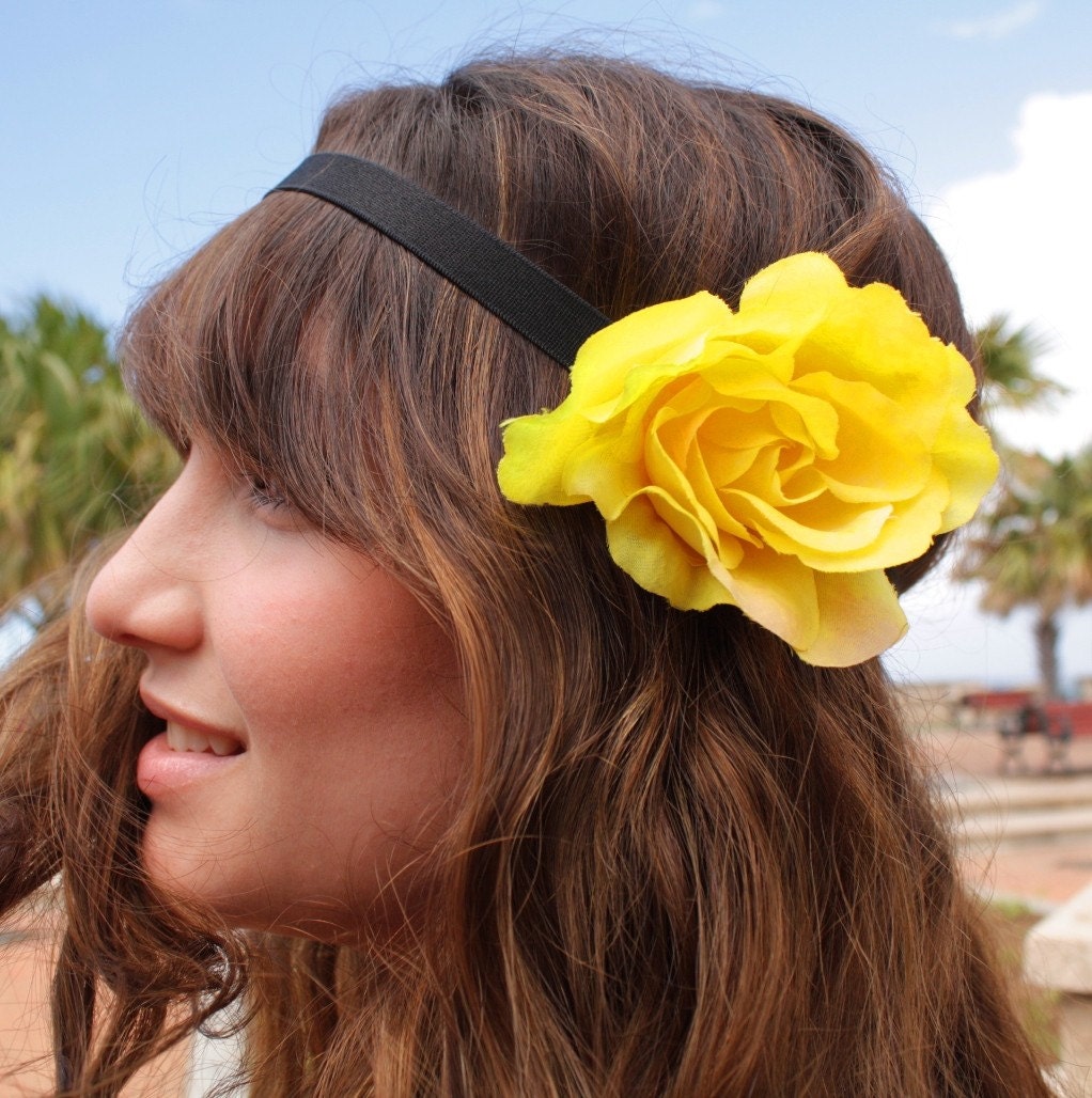  thinking of adding a braided hippie headband with an oversized flower