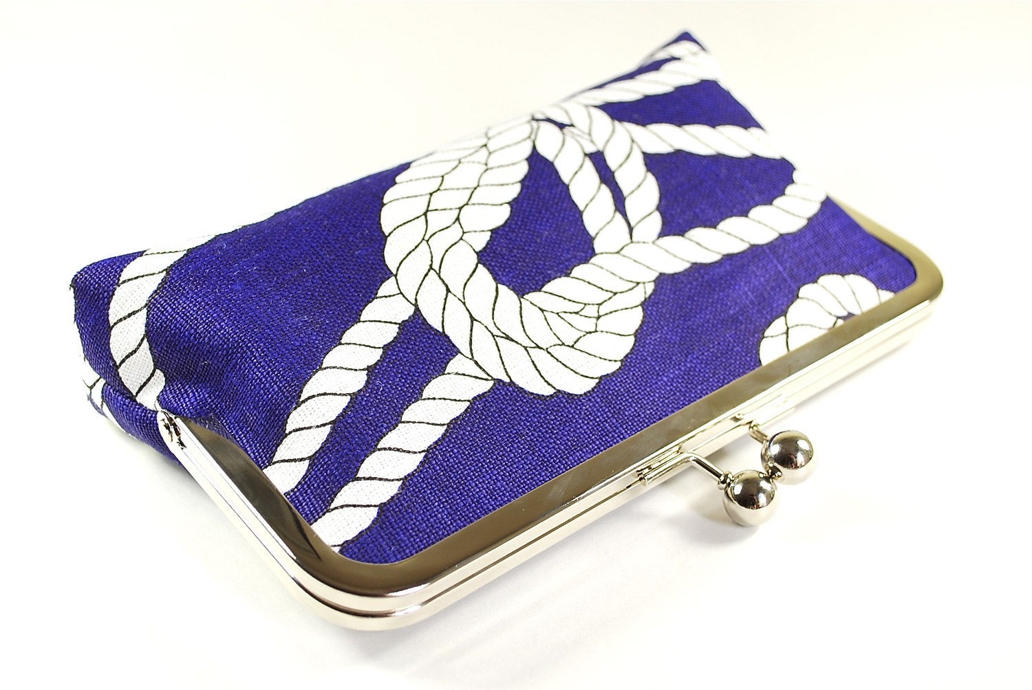 Royal blue linen clutch with naval knots