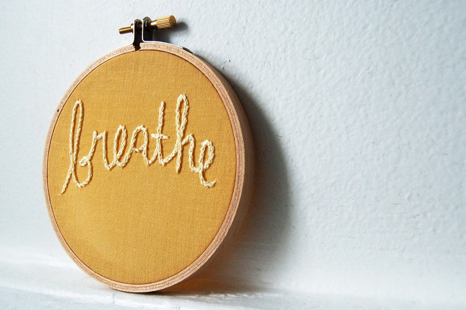 Breathe. Hand Embroidery in 4 inch Hoop. Yellow. Miniature Fiber Art Sign. Handmade by merriweathercouncil on Etsy