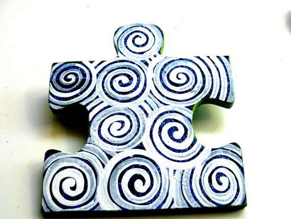 Spiral Up-cycle Puzzle Piece pins. Wearable Art