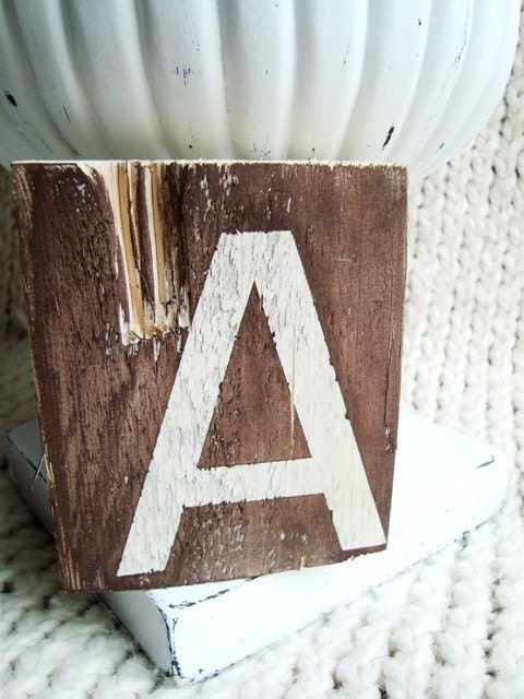 Letter A on distressed wood in White and Brown