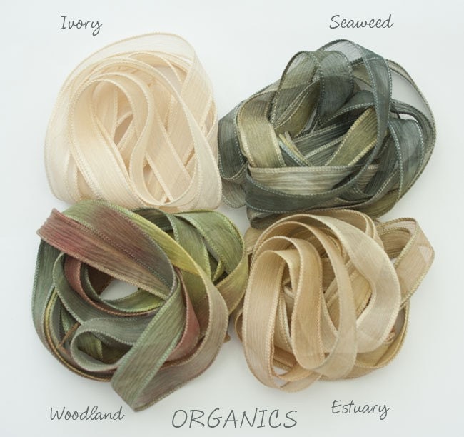 Four crinkle chiffon ribbons- one in each colourway - Ivory - a plain dyed ivory ribbon, Seaweed - sea greens with a little olive and gold , Estuary - pale sand tones with a little olive green and gold and Woodland - muted greens/oilve and brown. 