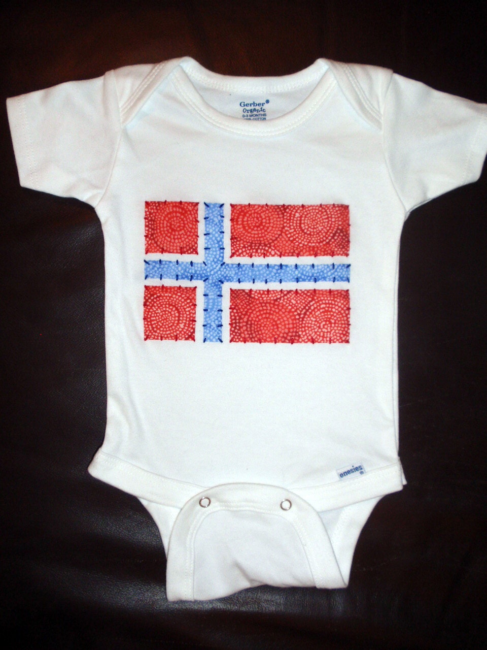 Custom Organic Onesie with Hand-Embroidered Flag Applique