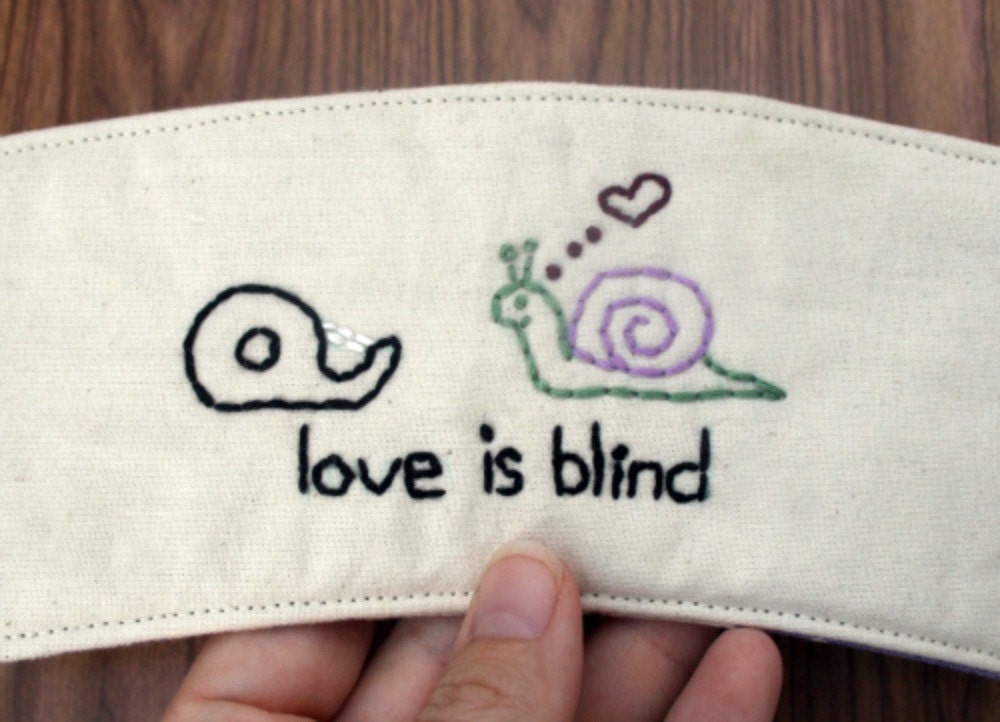 Love is blind cup cozy.