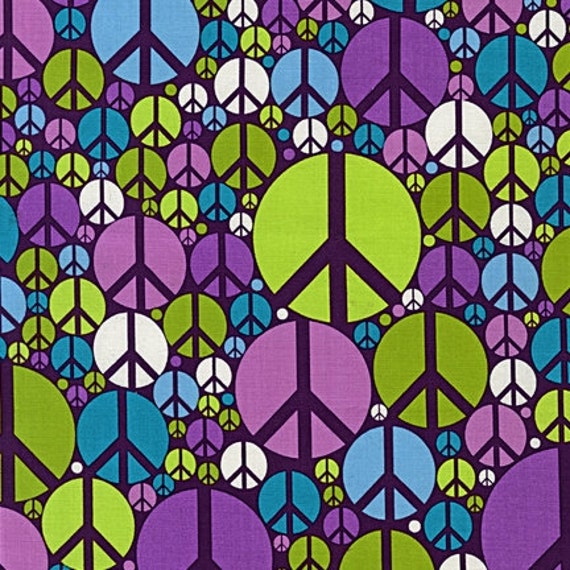 big pics of peace signs. This is retro ig and little peace signs fabric in garden, part of the quot;Peacequot; Collection from Iota for Robert Kaufman. The material is a quality cotton.