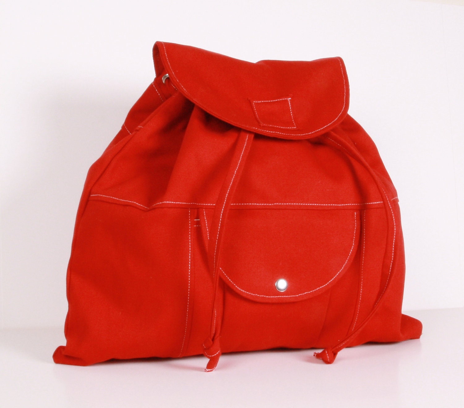 BACKPACK ...Red , canvas with  Cream lining ,adjustable straps