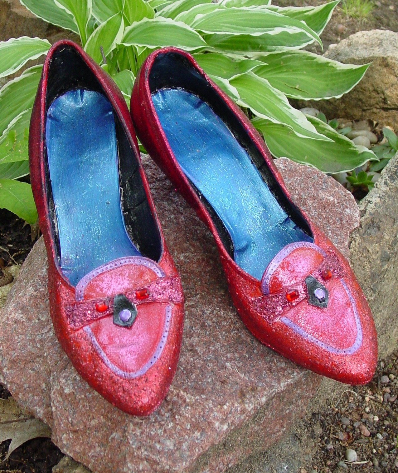 One of a series of four  recyled vintage hand made theatrical shoes for dorothy from the wizard of Oz by recyled artist Catherine Reine.Watch out they are  Magical they will take you home