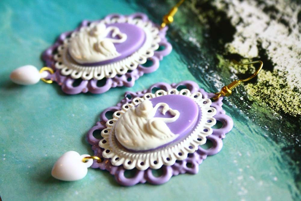 Winter swan in lavender setting earrings.