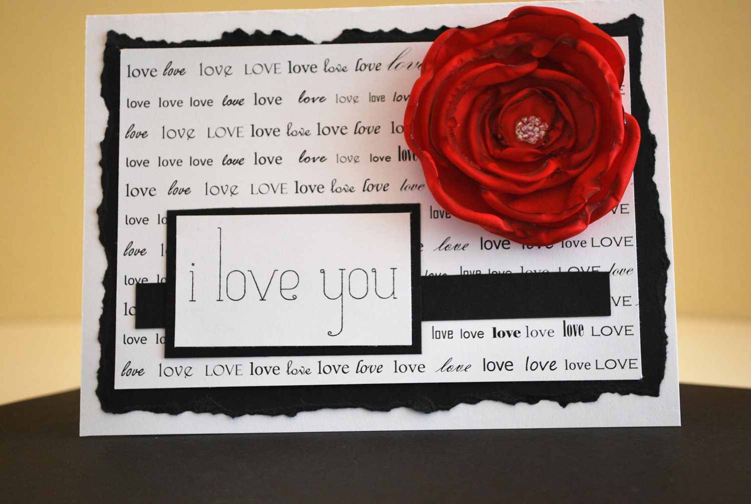Black and White "I Love You" Card with Red Fabric Flower