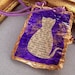 Purple rectangle pendant with cat