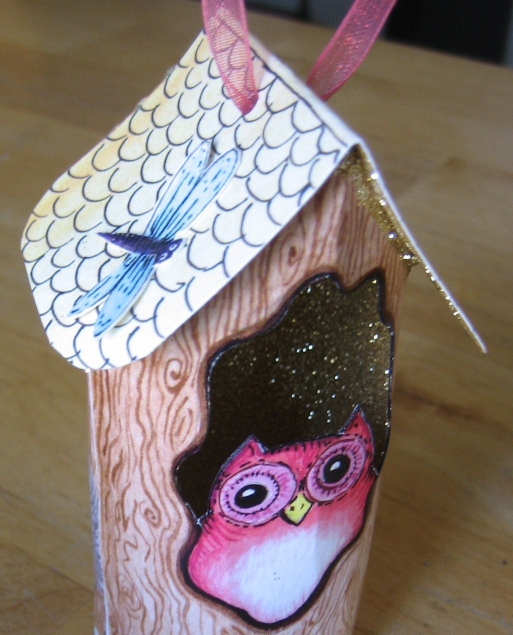 <br />hollow tree with owl ,bat and squirrel limited edition ornament<br />