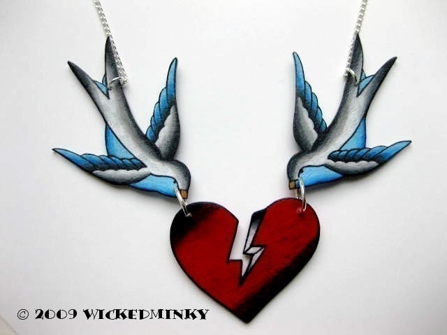 vintage tattoo style sparrows holding broken heart necklace